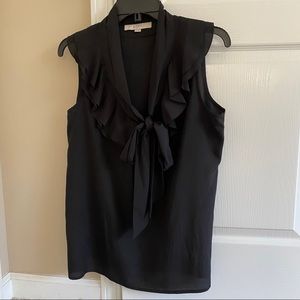 Sleeveless Loft black blouse with ruffles and bow